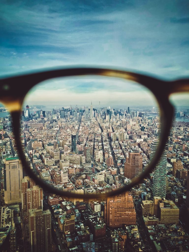 View of New York through a pair of glasses